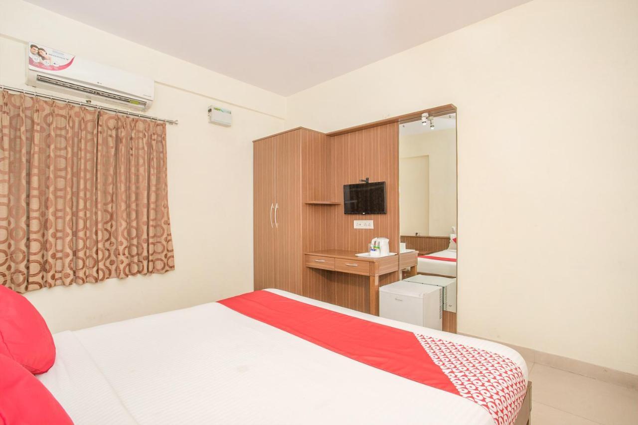 Oyo 7669 The Trinitywood Hotel Bangalore Esterno foto