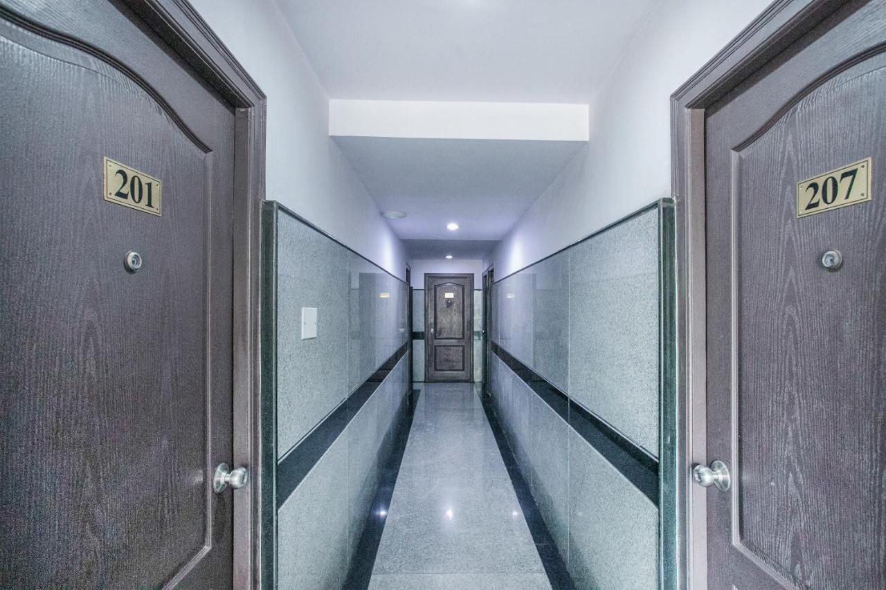 Oyo 7669 The Trinitywood Hotel Bangalore Esterno foto