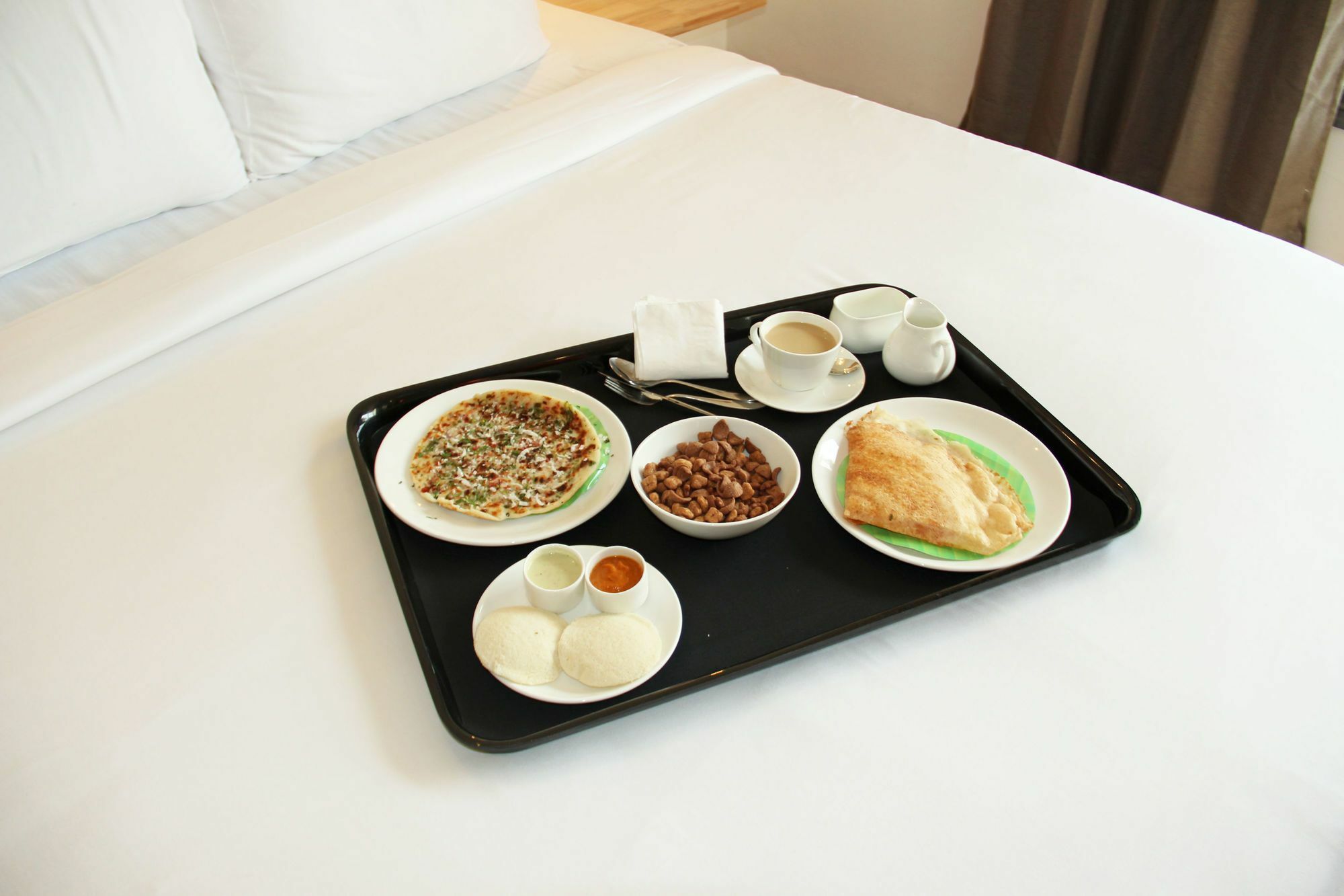 Oyo 7669 The Trinitywood Hotel Bangalore Esterno foto